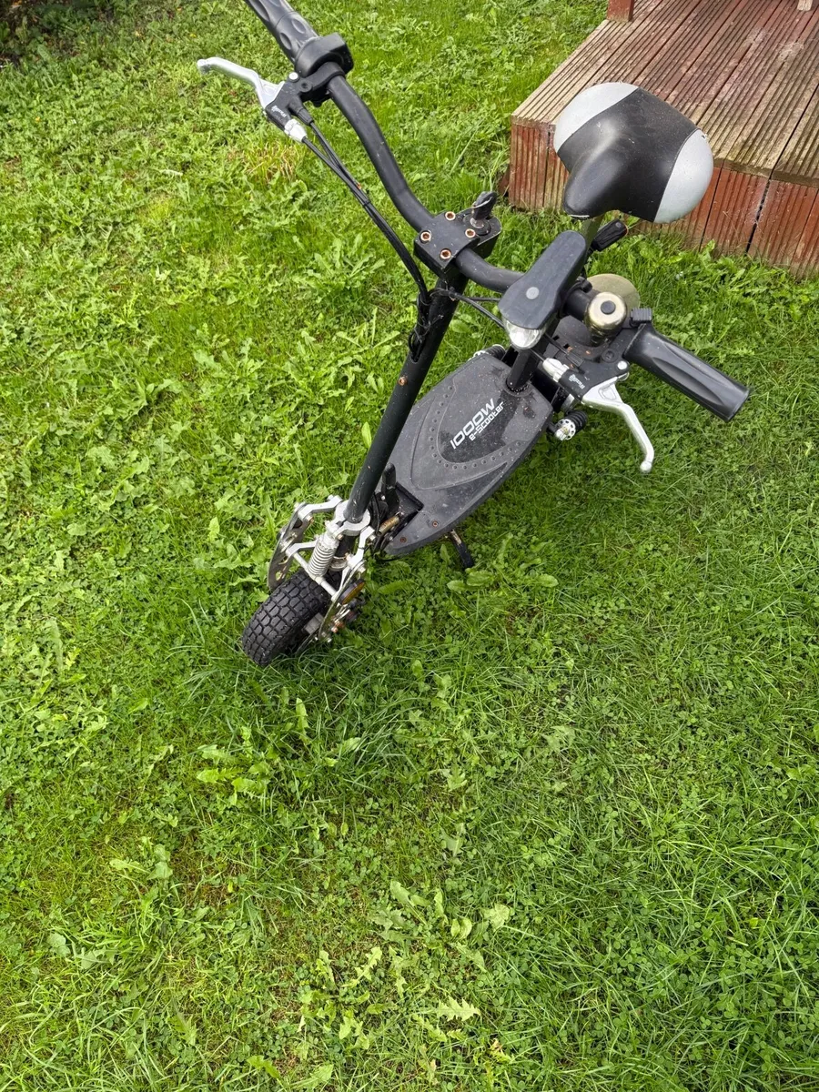 Electric Scooter + Charger - Image 1