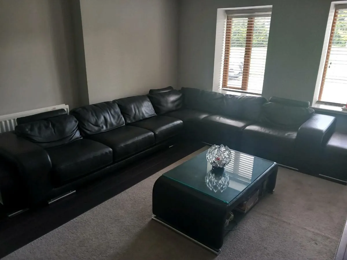 Large black L shape leather sofa - Image 1