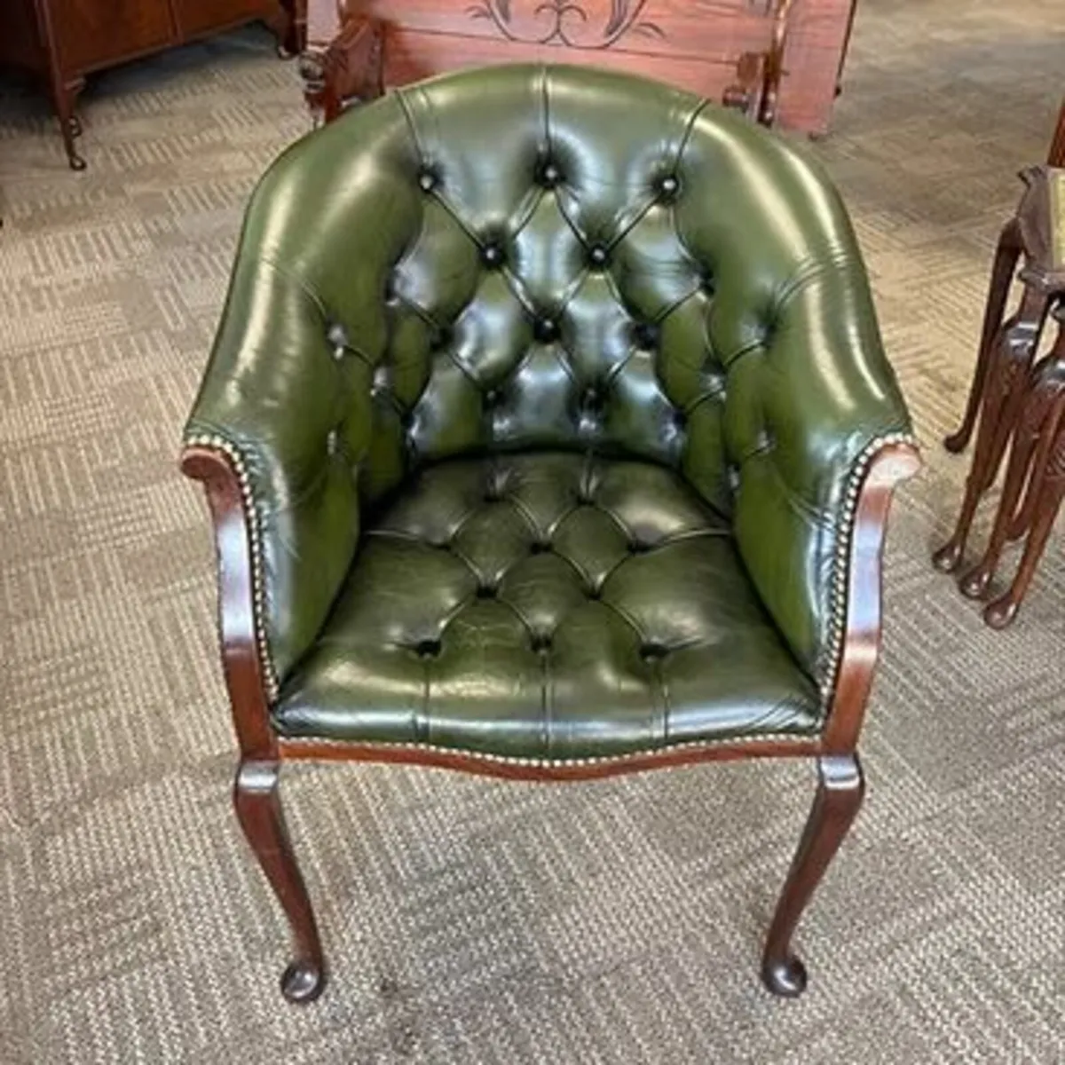 Fabulous green leather mahogany framed button back