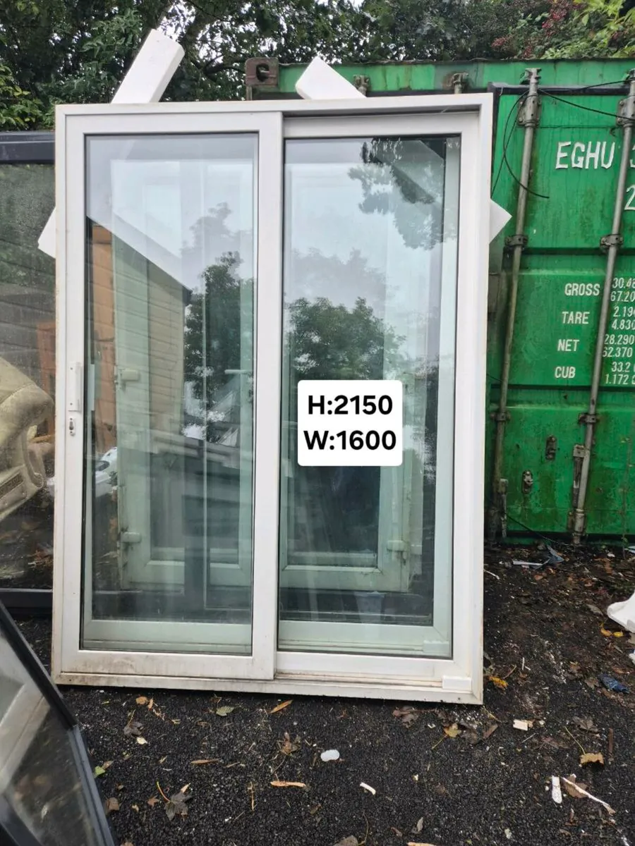 PVC PATIO SLIDING DOORS 2 SETS - Image 1