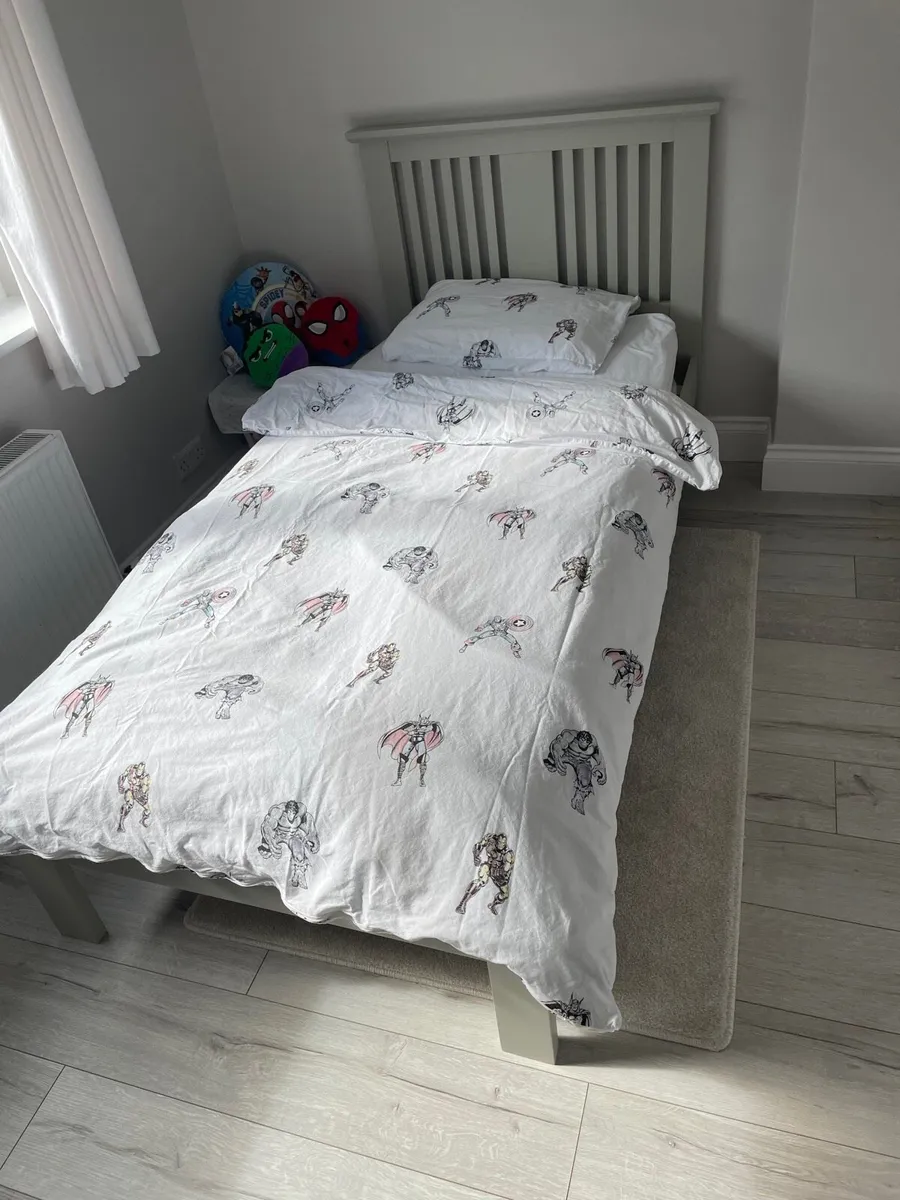 Light grey single bed