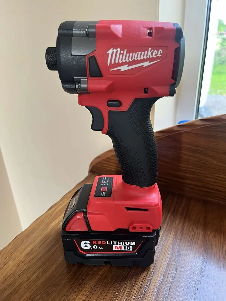 BRAND NEW Milwaukee Impact Driver + Battery - Image 1