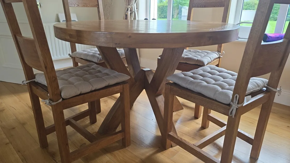Solid oak dining table and four chairs. - Image 2