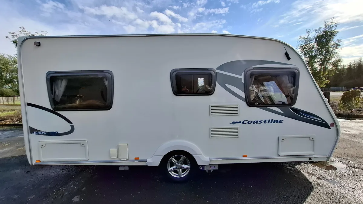 Swift Sterling Coastline 470 Caravan fixed bed - Image 1