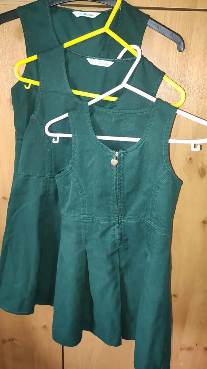 Three green pinafore dresses. - Image 1