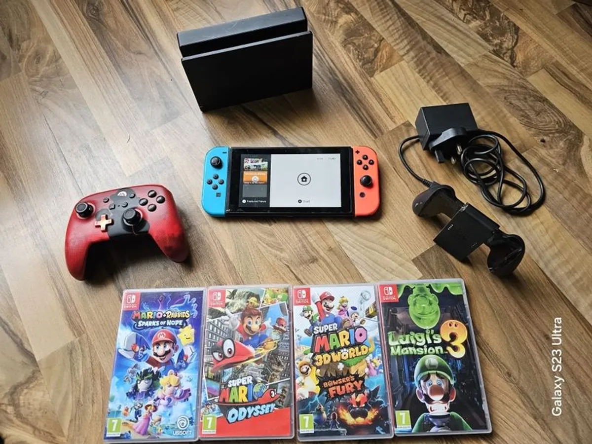 Nintendo Switch with Games and accessories - Image 1