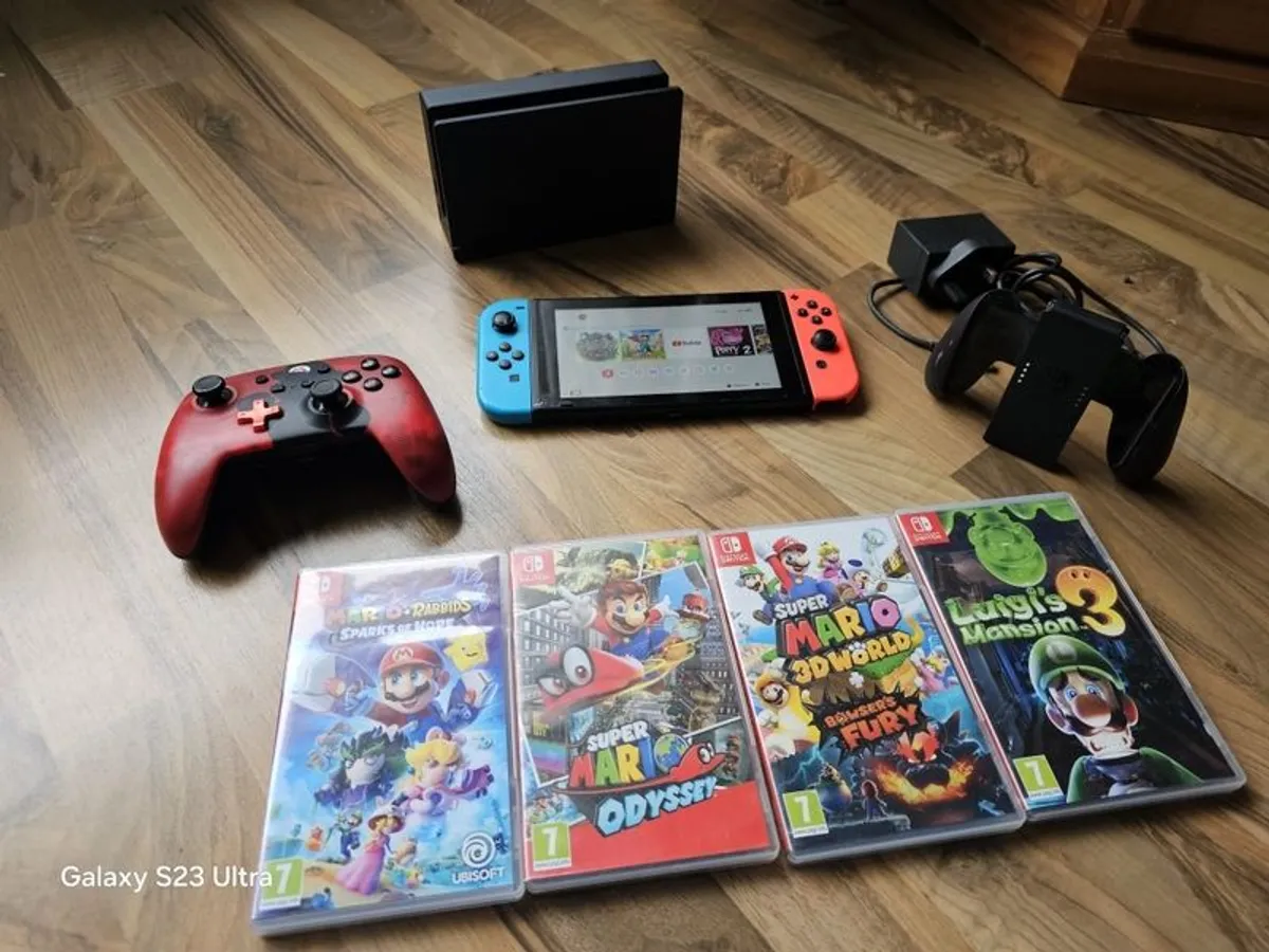 Nintendo Switch with Games and accessories - Image 2