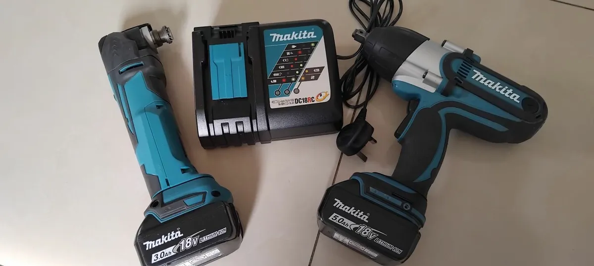 Makita DTW450 Impact Wrench + DTM51 Multi Tool 18v - Image 1
