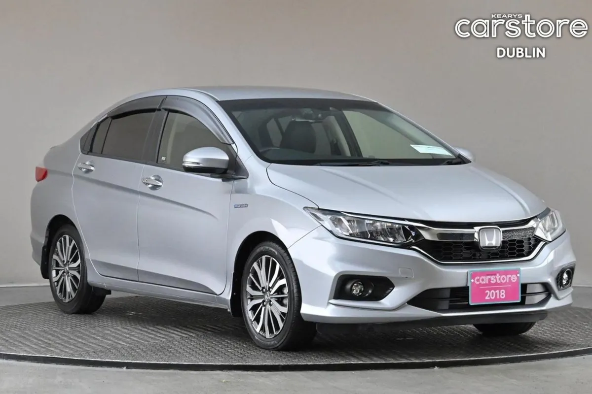 Honda Grace 1.5 Hybrid 4DR Auto  half Leather 9 a - Image 1