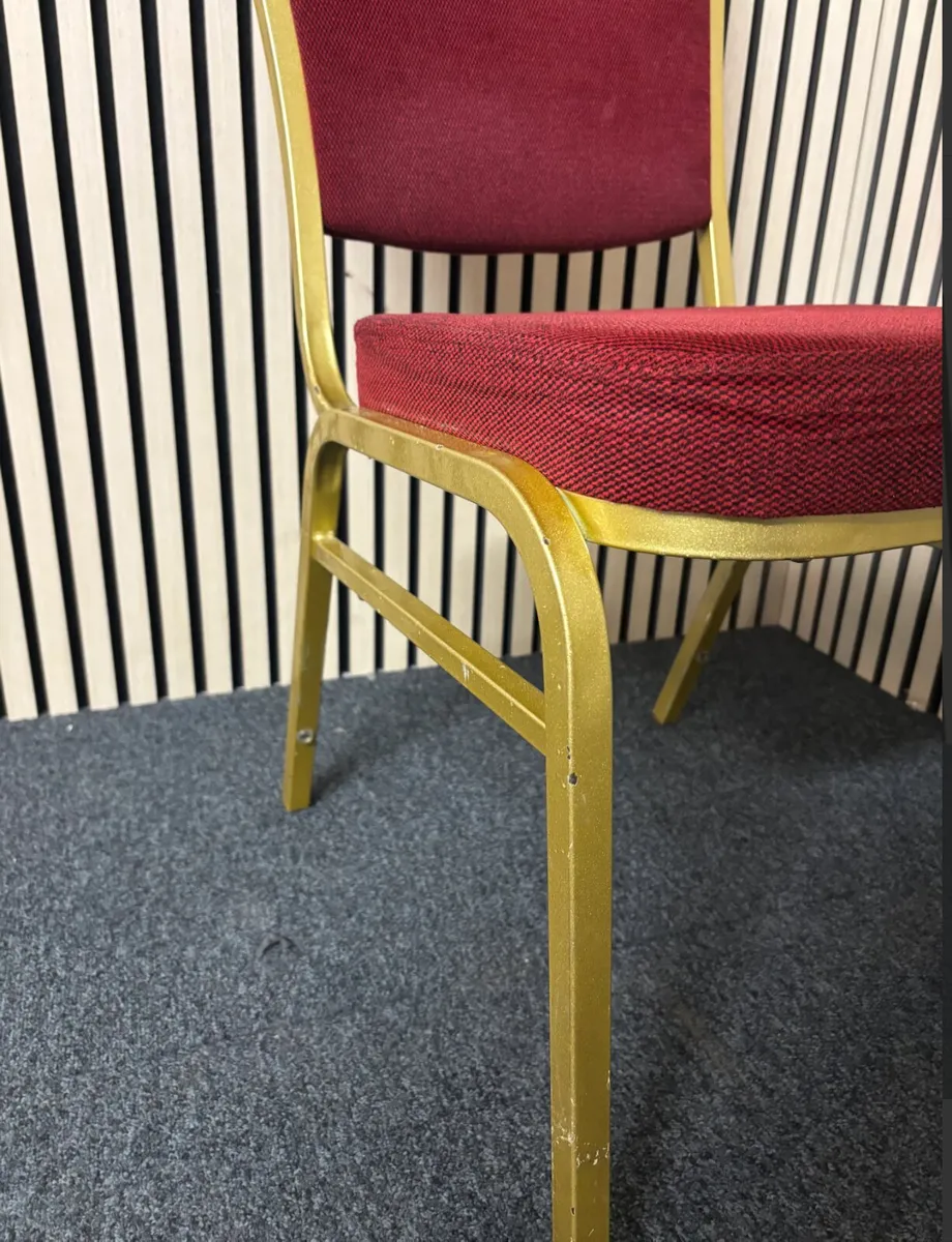 Solid metal framed red fabric banquet chair at CJM - Image 2