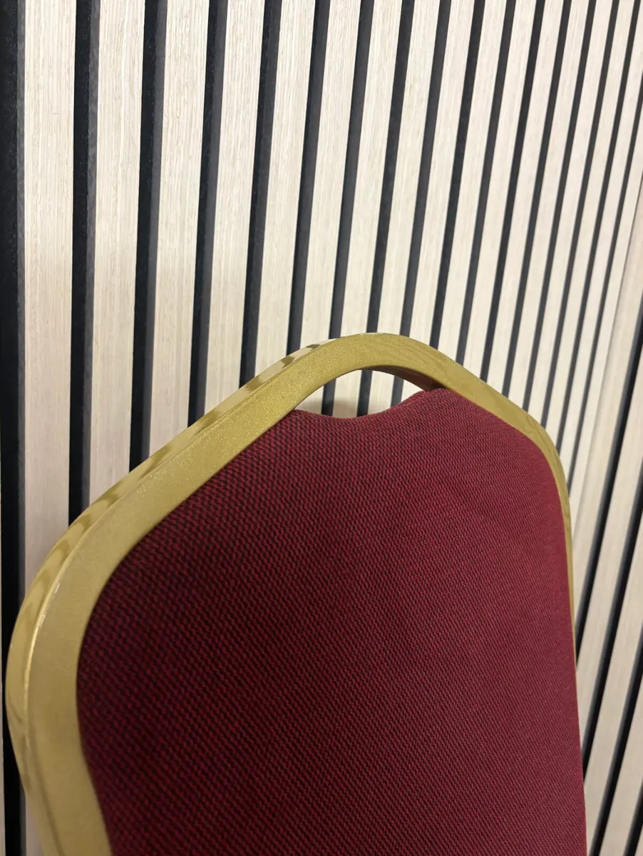 Solid metal framed red fabric banquet chair at CJM - Image 3