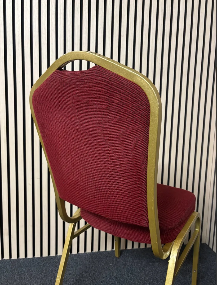 Solid metal framed red fabric banquet chair at CJM - Image 4