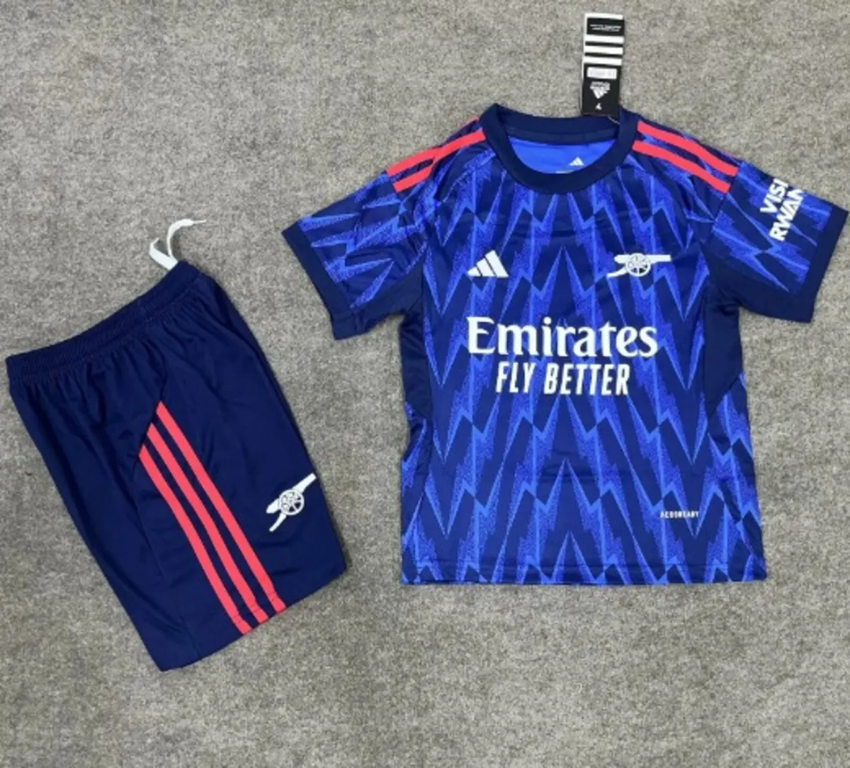 Arsenal home, blue and white away kid sizes - Image 1