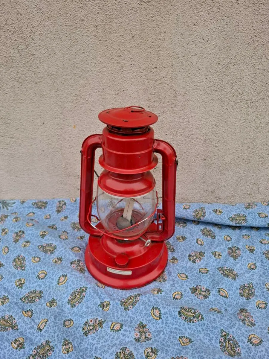 Tall red storm lamp postage possible