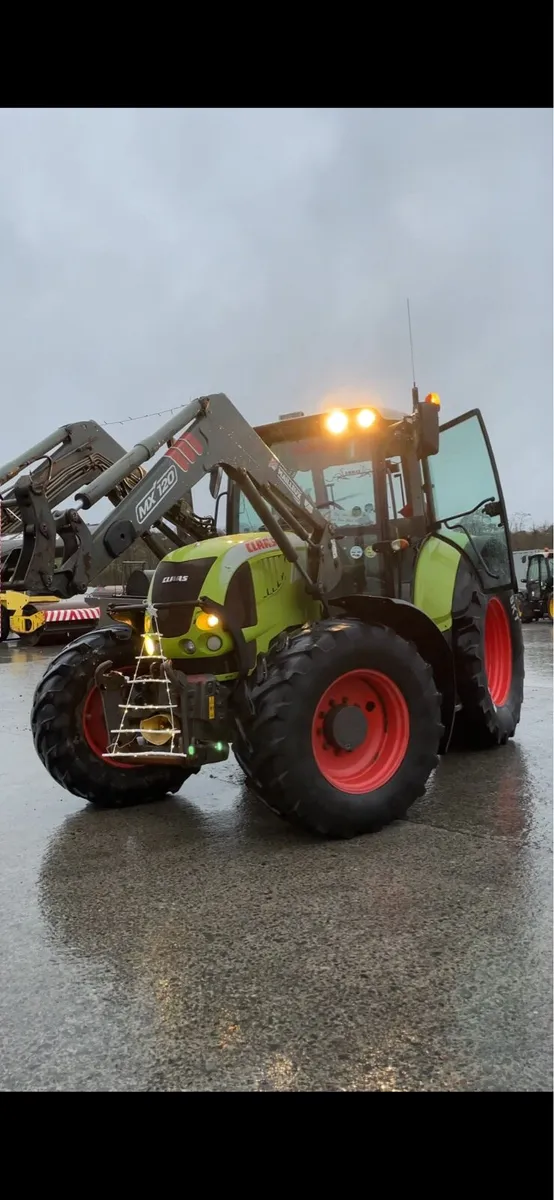 CLAAS ARION 640 with QUICKE front loader - Image 2