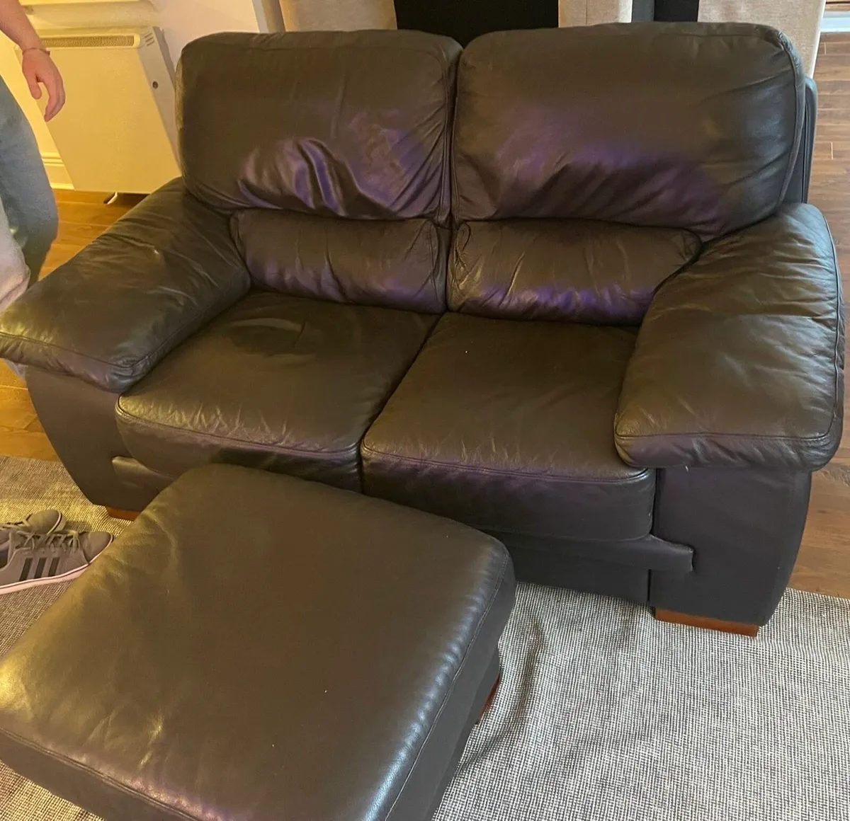 Black leather couch & foot rest