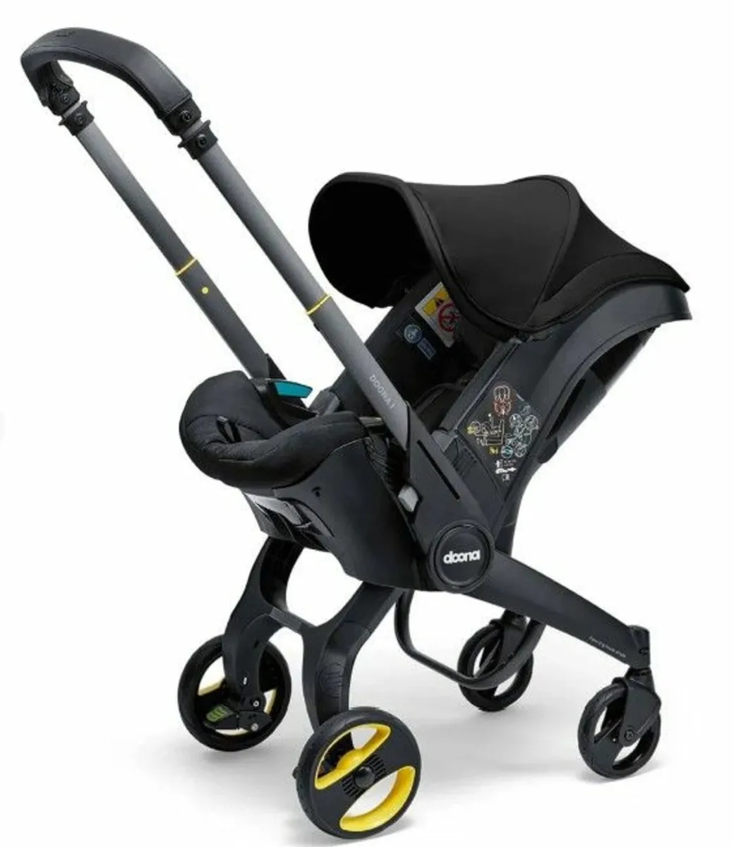 Doona Car Seat + Car Base + Rain Cover - Image 3