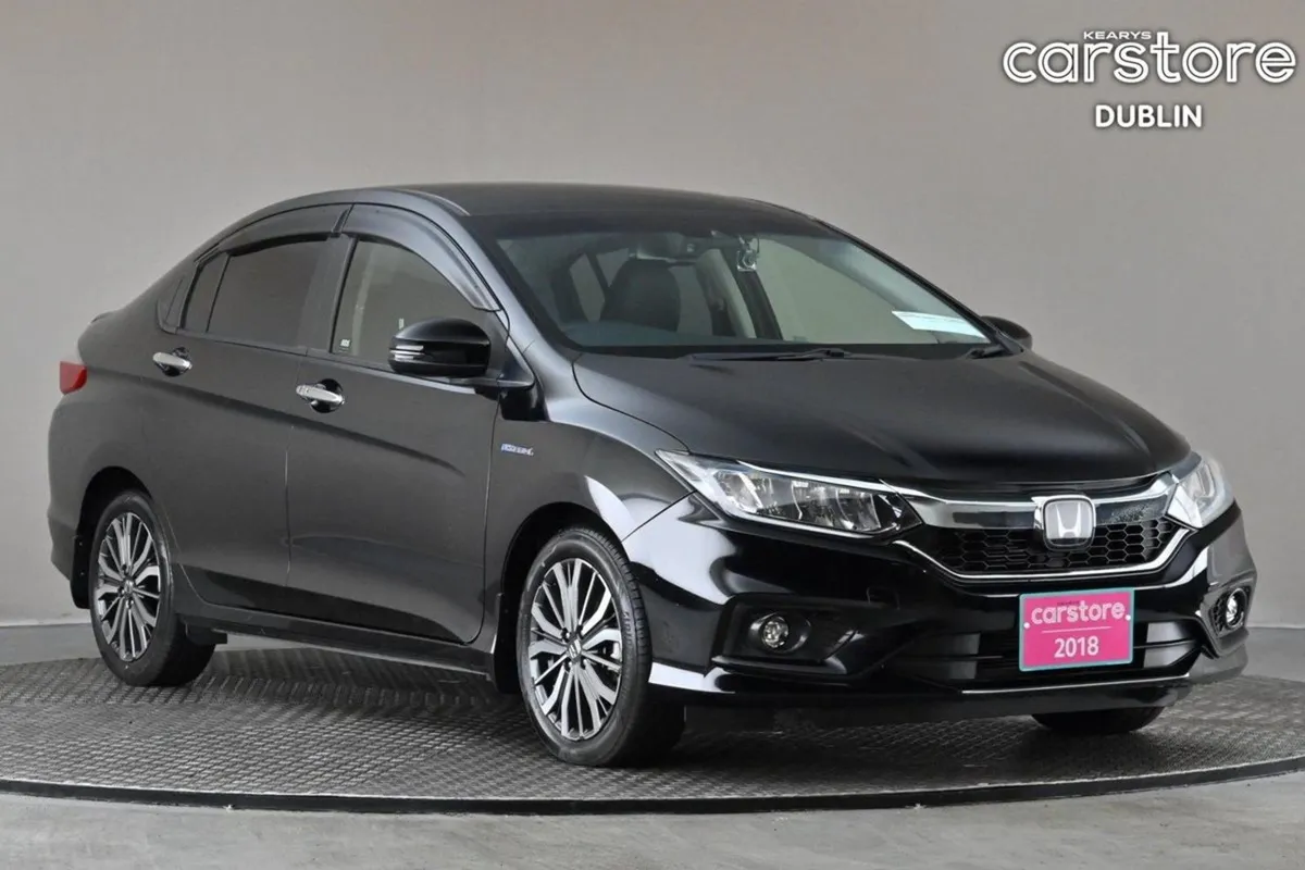 Honda Grace 1.5 Hybrid 4DR Auto  half Leather 9 a - Image 1
