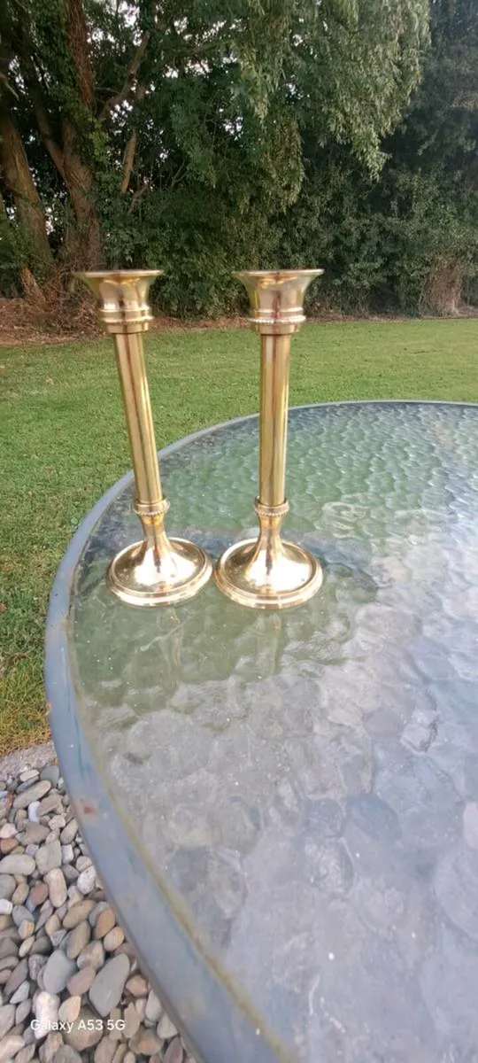 2 small  brass candle stick holders