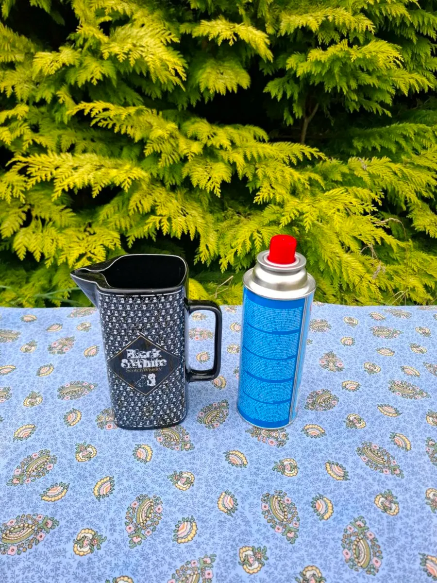 Black and white whiskey pitcher postage possible
