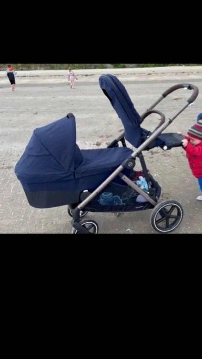 Cybex gazelle double with two seats and a carry cot