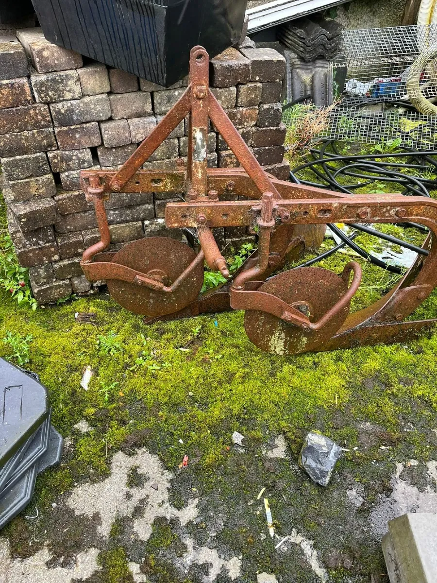 Antique farm machinery - Image 1