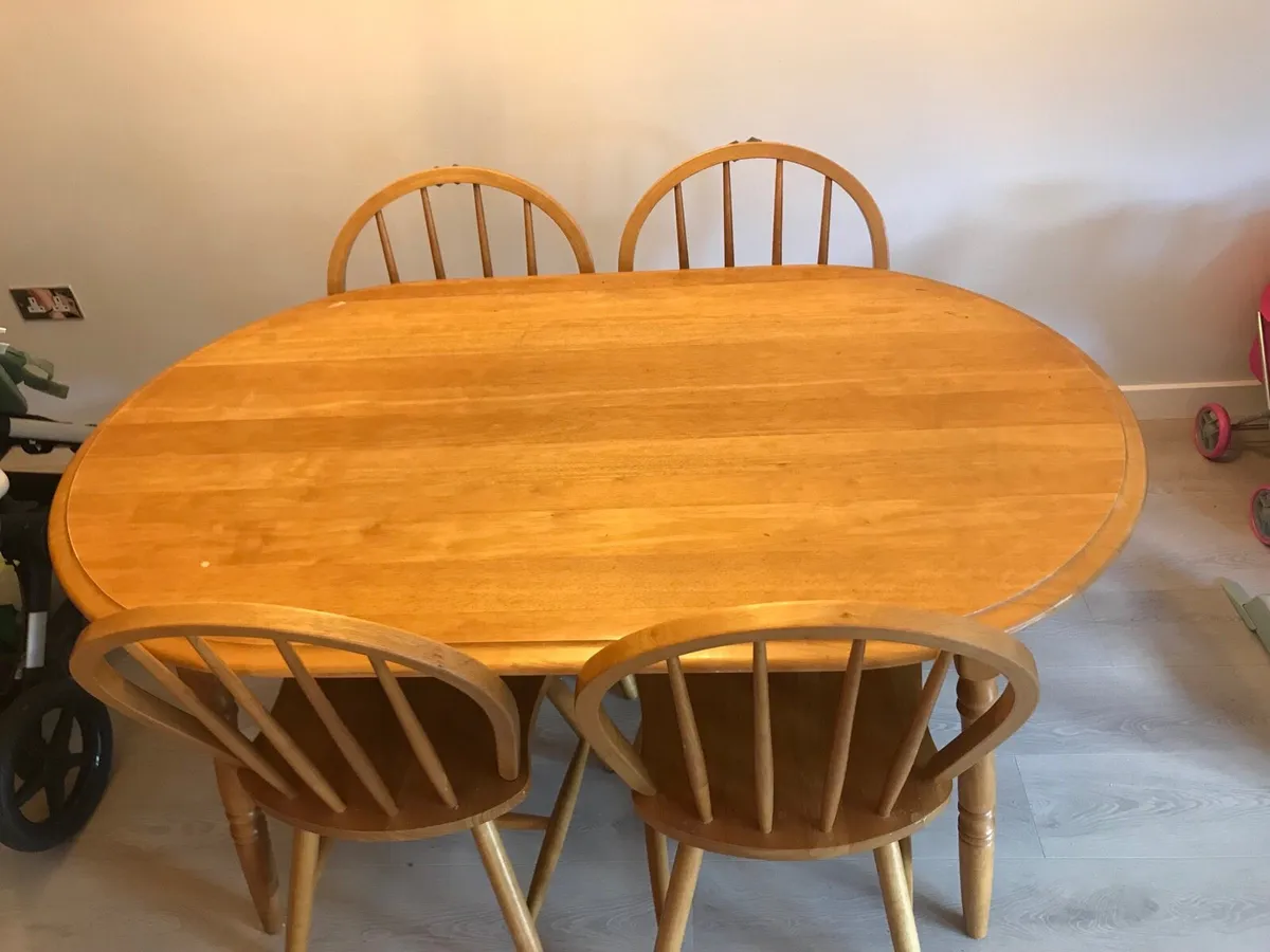 Rubber wood table and chairs - Image 1