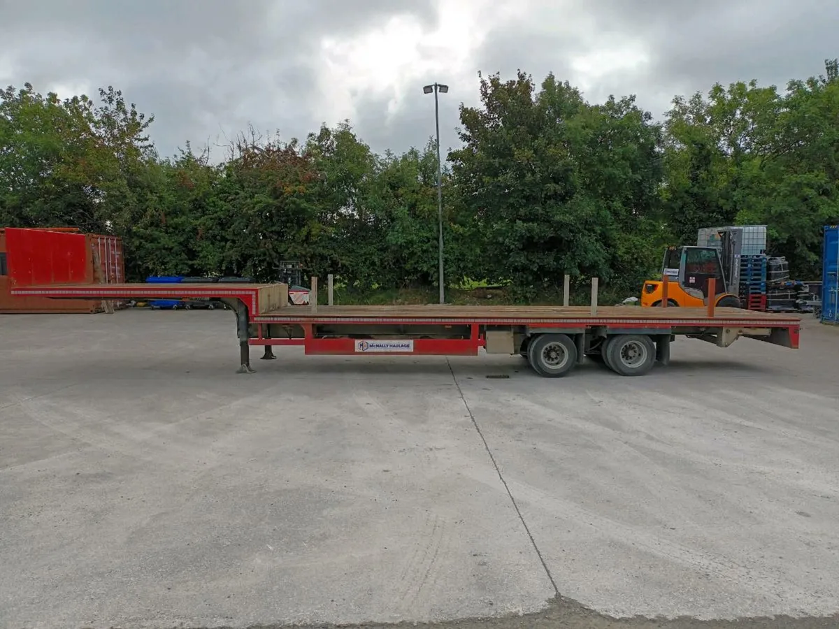 Rear steer stepframe flat trailer. - Image 1