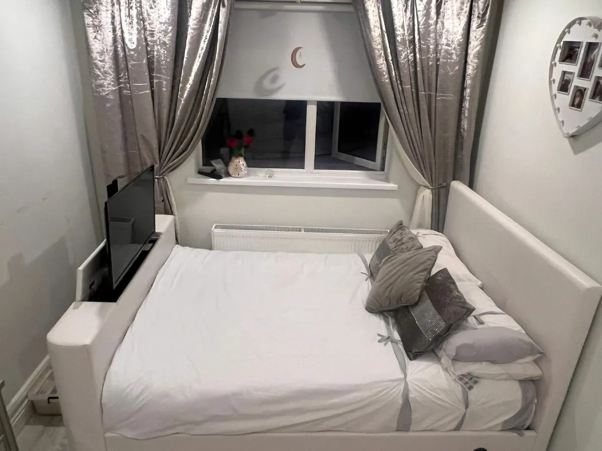 4ft6 Double White Faux Leather TV Bed Frame - Image 1