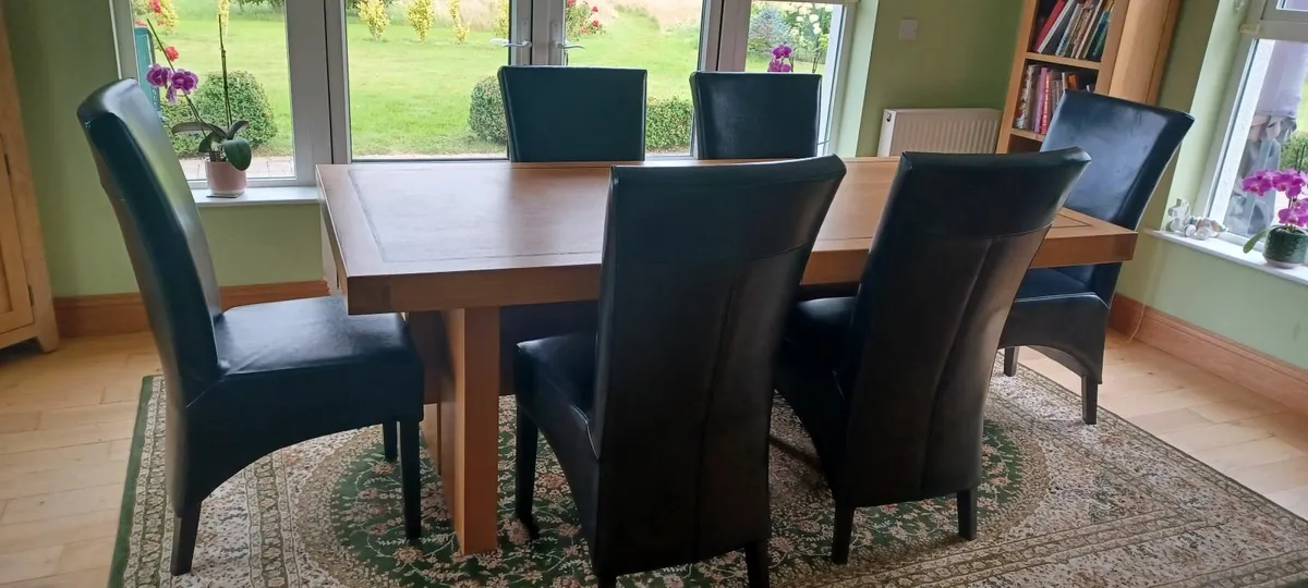 Black leather dining chairs - Image 1