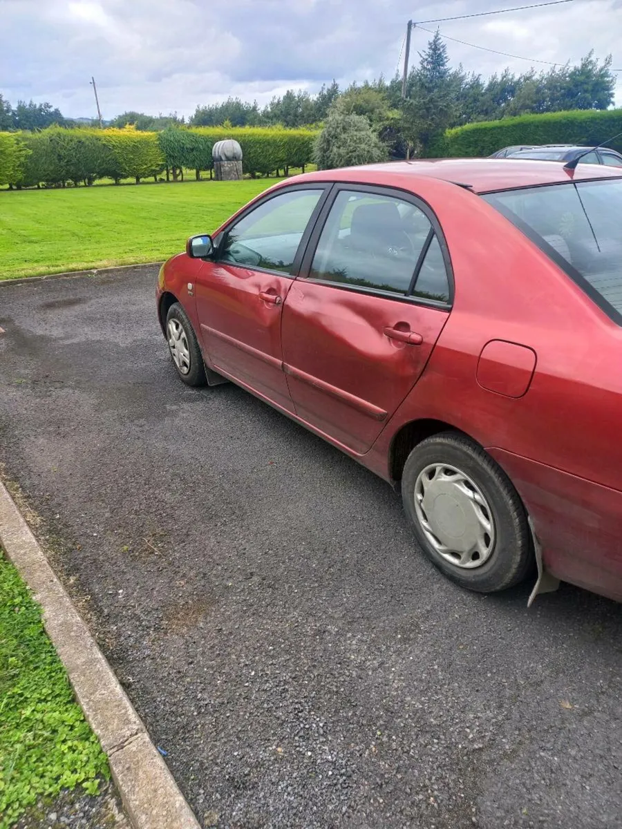 2002 toyota corolla door