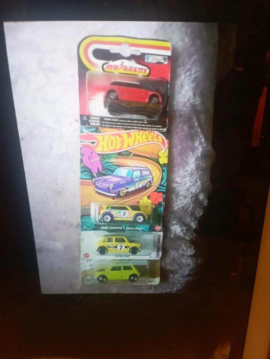 A COOLLECTION OF HOT WHEELS MINI COOPER CLASSIC - Image 1