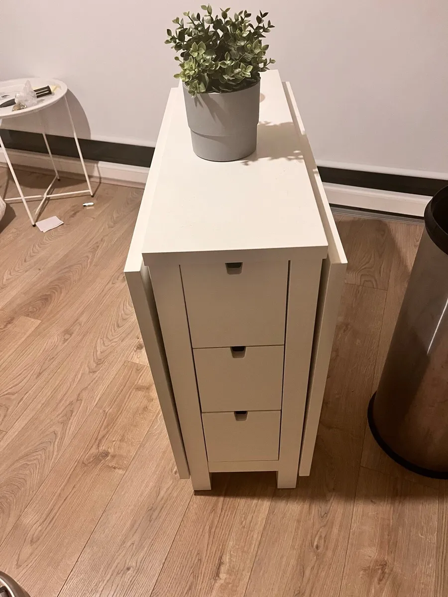Extendable white storage table with drawers - Image 1