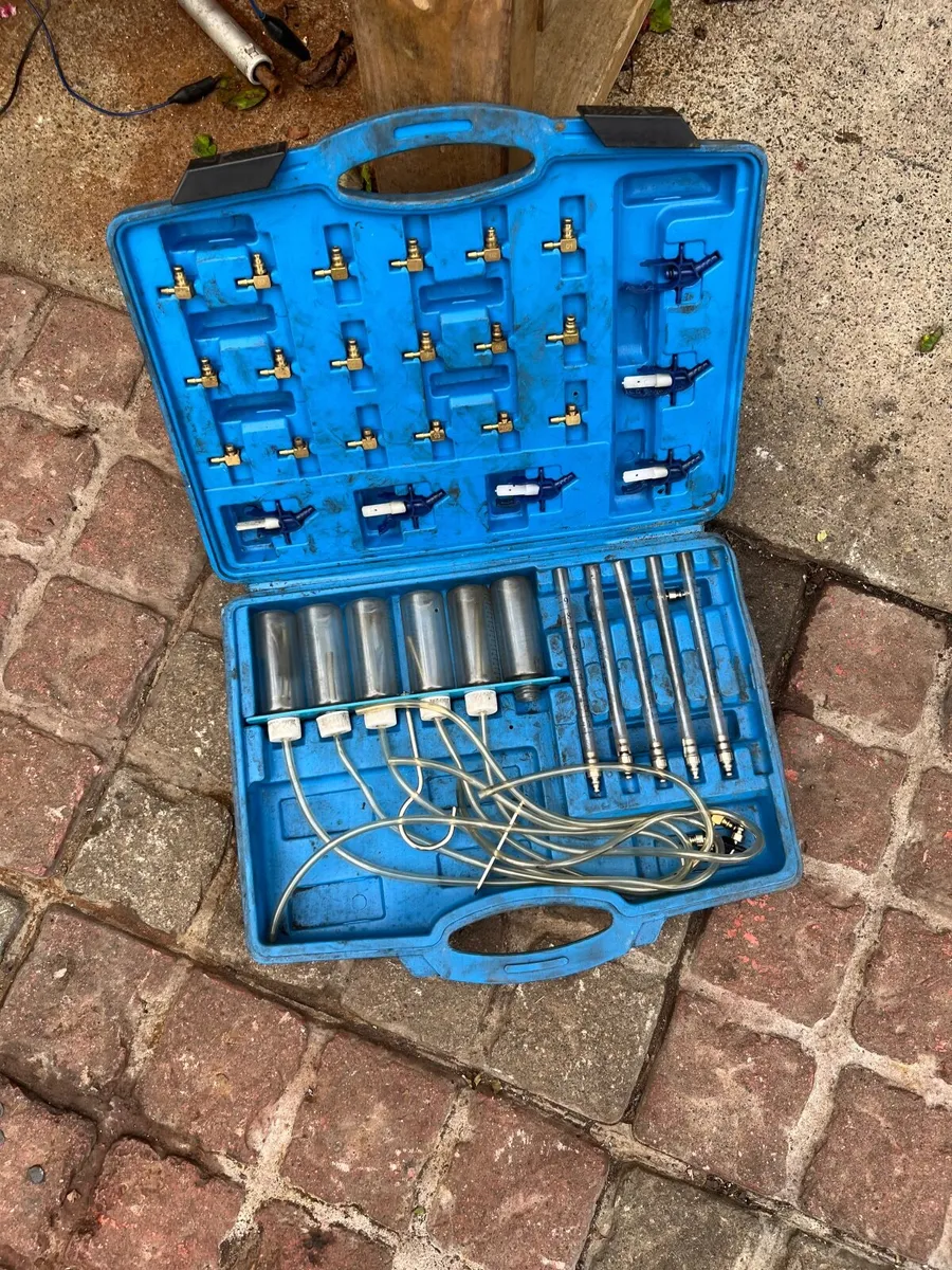 Injector leak off tester