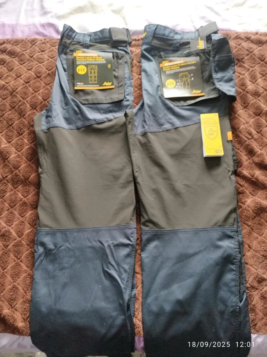 two pairs of snickers pants - Image 1