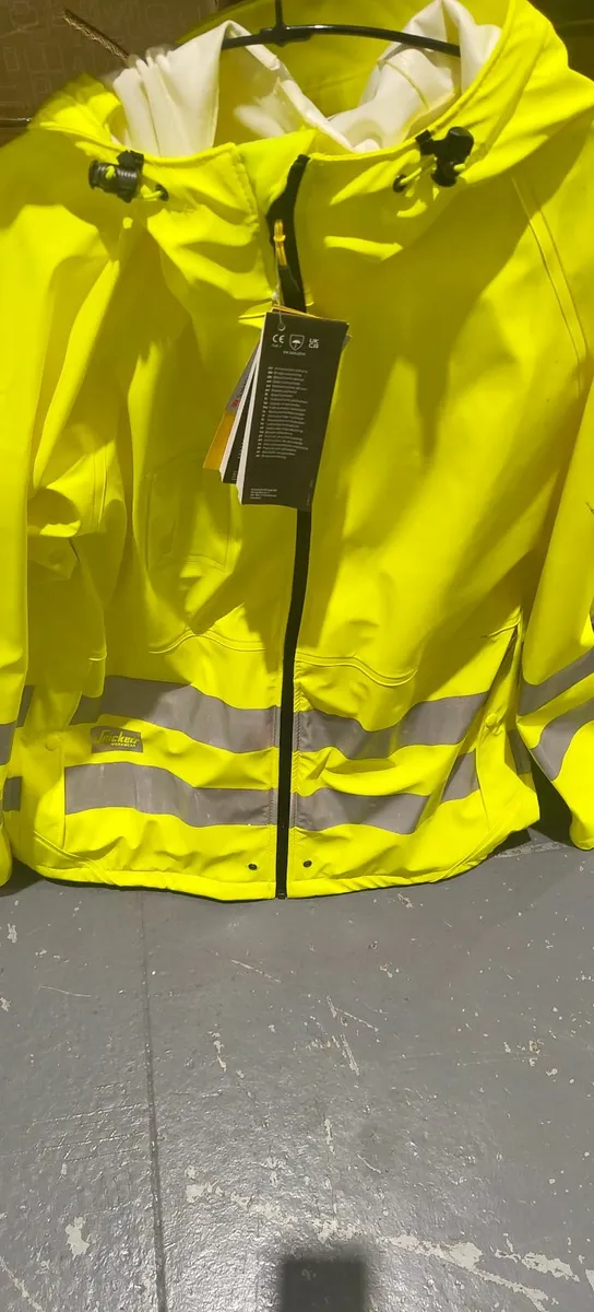 Brand New Genuine Snickers Rain Jacket - Image 1
