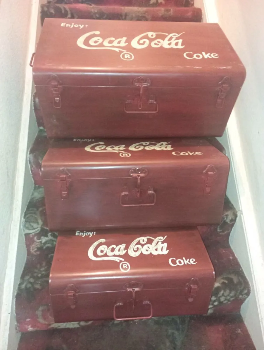 A NEST OF RETRO STEEL COCA COLA  TRUCKS. - Image 1