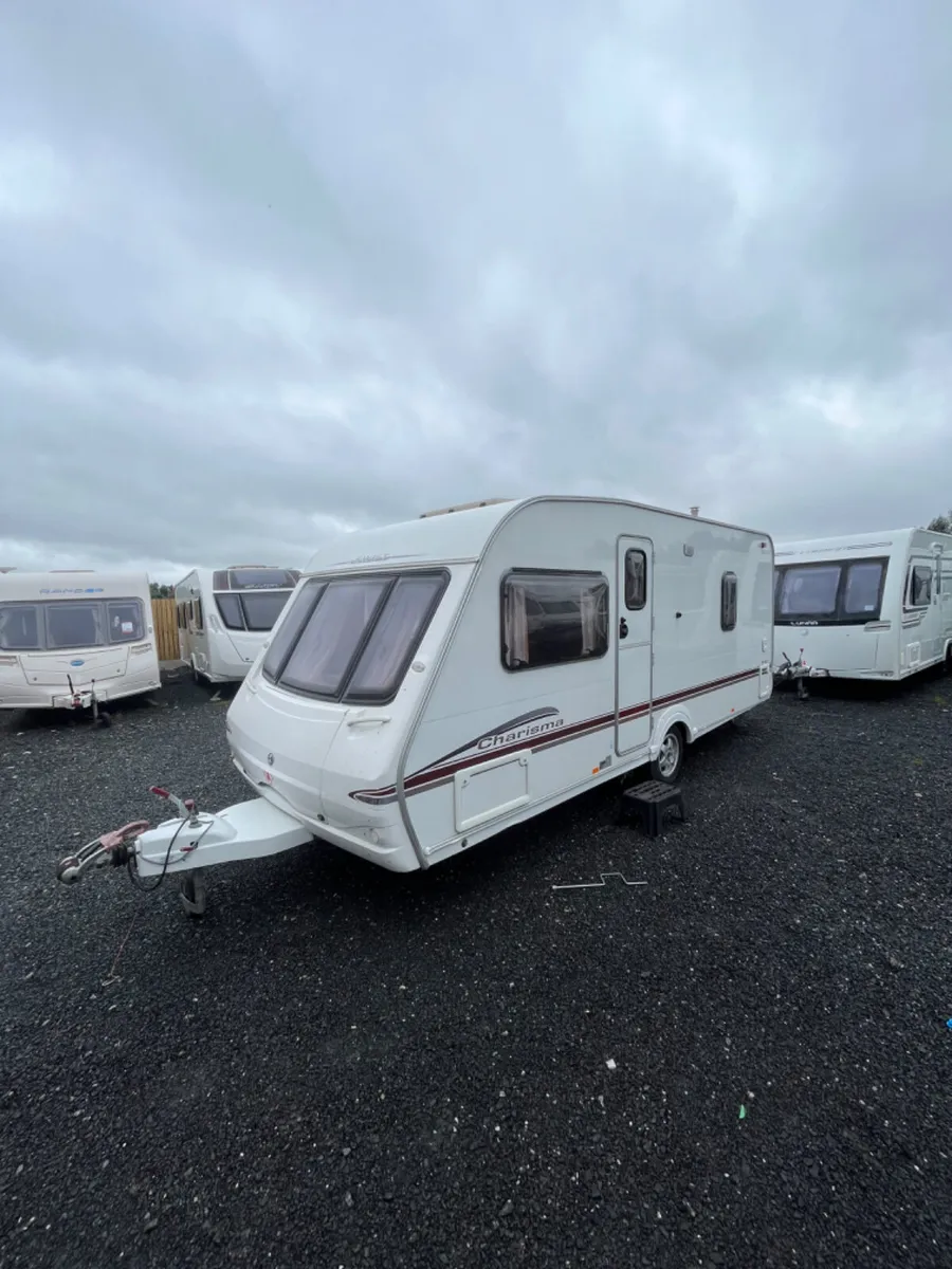 Swift 4 Berth Fixed Bed + Awning Caravan - Image 1