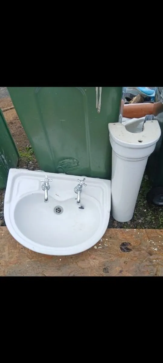 bathroom sink with taps - Image 1