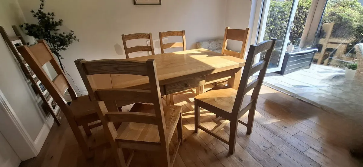 Solid oak table and 6 chairs