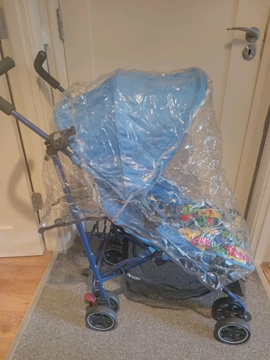 Mothercare baby's buggy with rain cover - Image 1