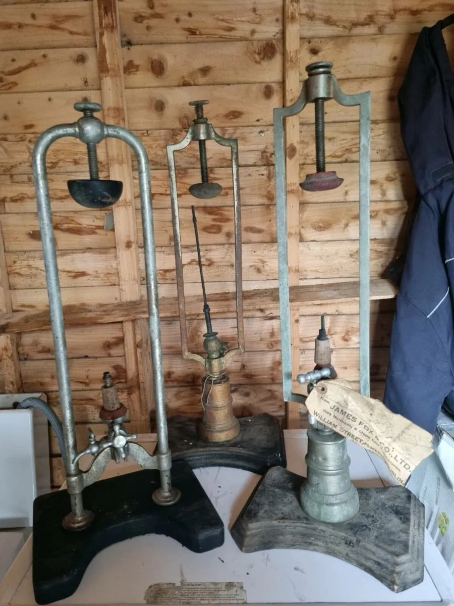 Old brass pub bottle  holder s - Image 1