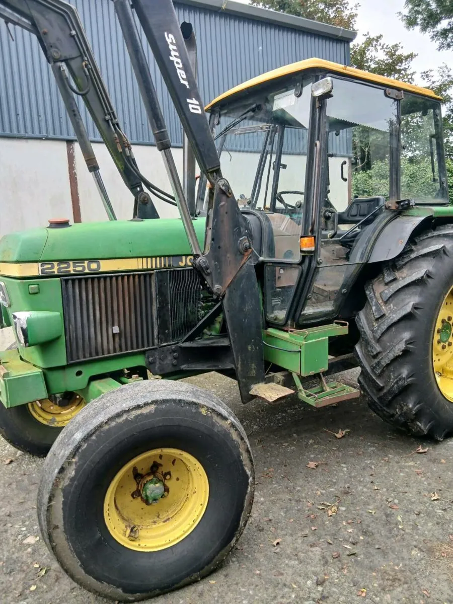 John Deere 2250   gears on floor..taxbook - Image 1