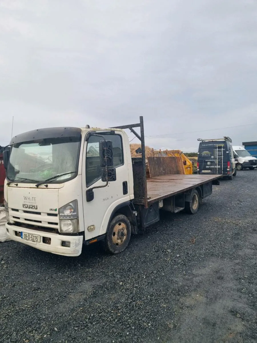 ISUZU 150 NPR FLAT BED - Image 1