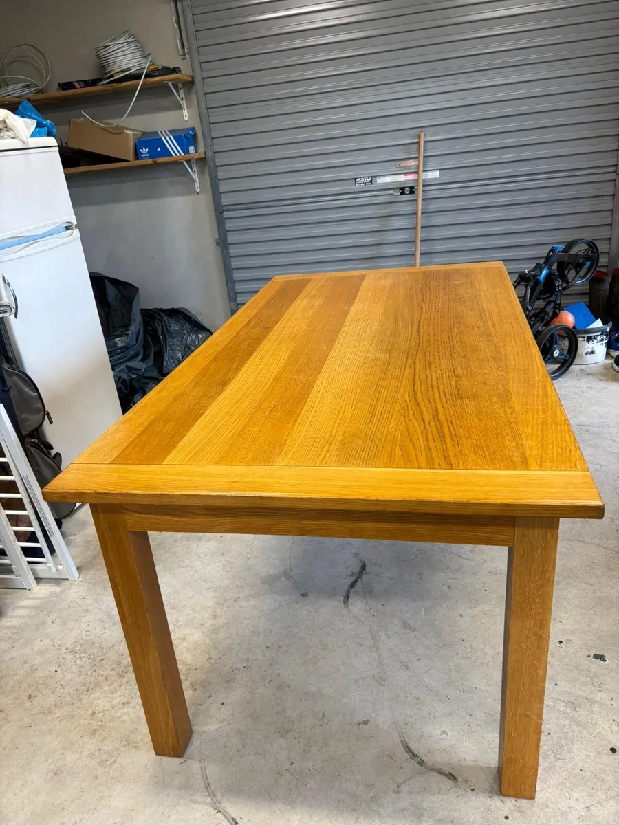 Solid oak dining table - Image 1