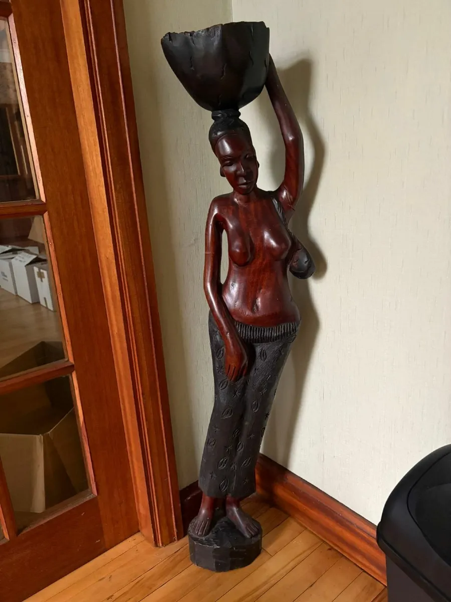 Hand carved wooden statue of a women