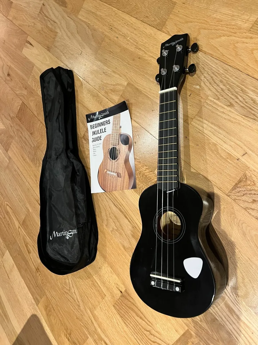 As-new Black Ukelele - Image 1