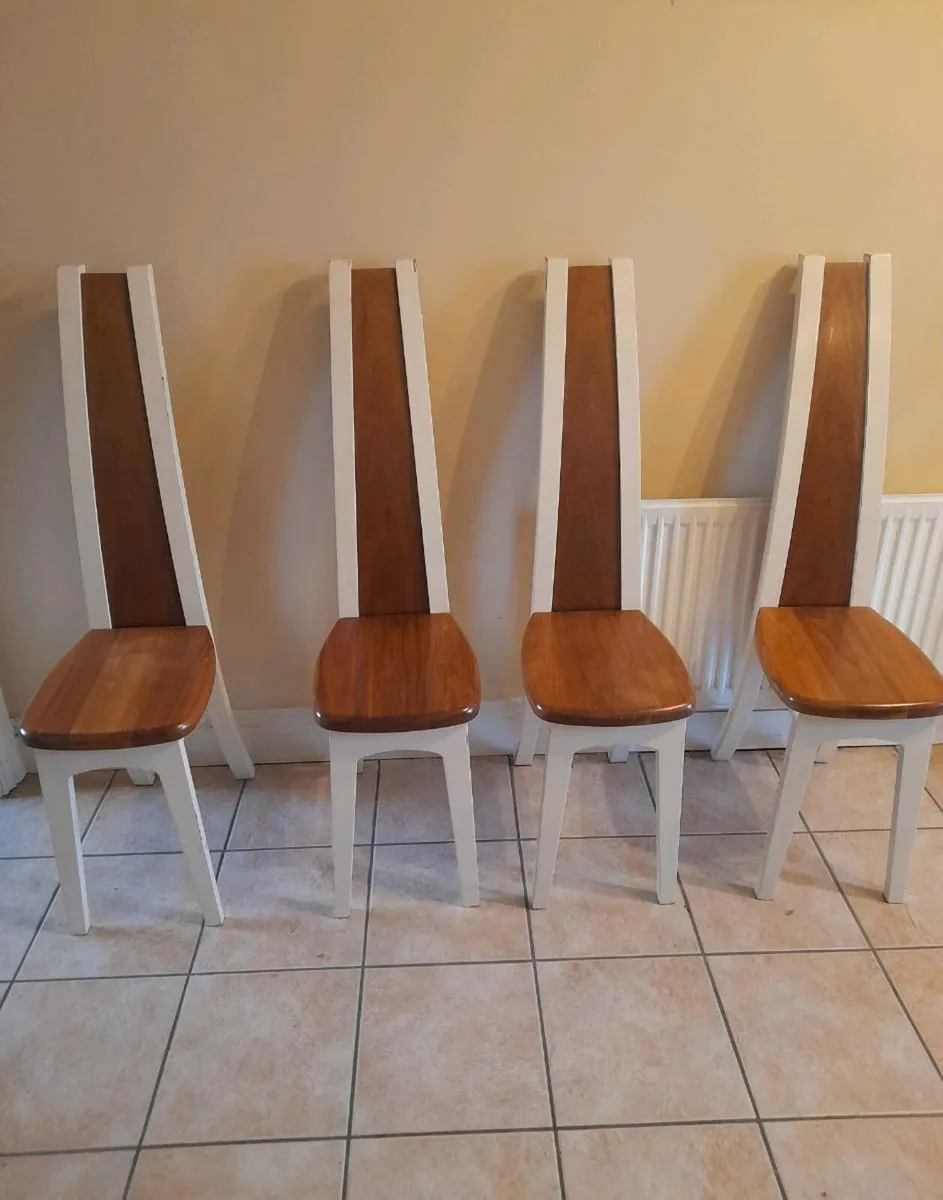 4 Unique Solid Chairs Great Condition