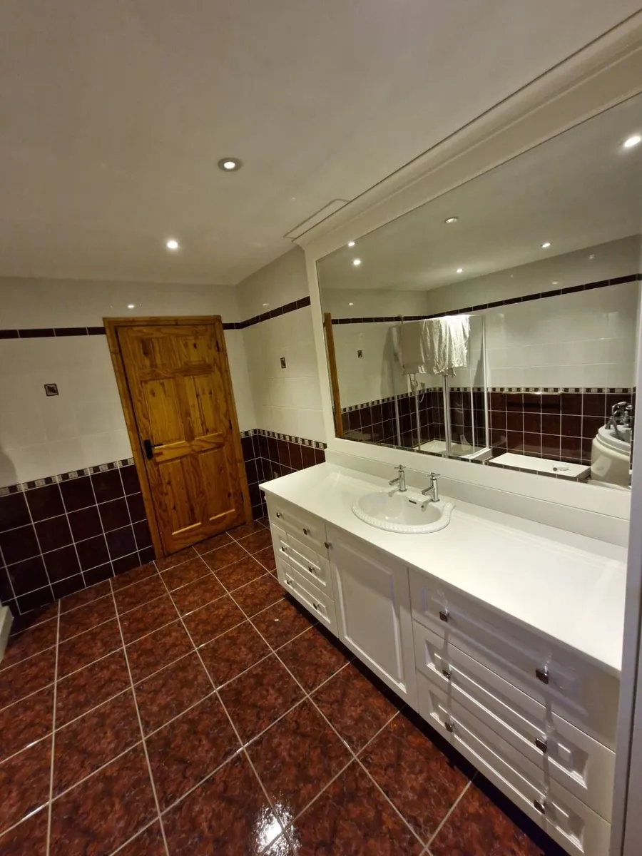 Bathroom Vanity and Corner Bathtub - Image 2