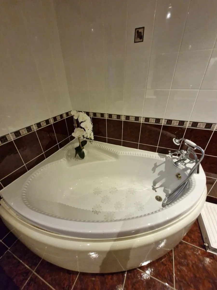 Bathroom Vanity and Corner Bathtub - Image 3